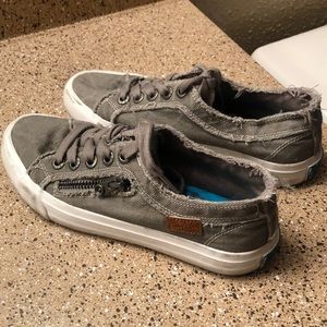 Distressed grey sneakers